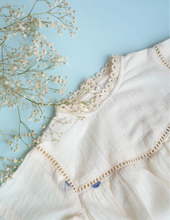 Load image into Gallery viewer, A zoomed out picture of Baby Girl Romper and Detachable Vest | Cotton | Indigo ,a baby girl dress without the vest against a blue background