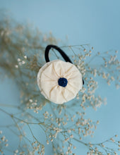Load image into Gallery viewer, A Picture of the white and indigo hair accessory that comes along with the set.