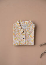 Load image into Gallery viewer, Beautiful cotton pajamas set kept upon a peach background.