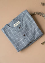 Load image into Gallery viewer, Beautiful cotton pajamas kept upon a peach background with a dry leaf aside.