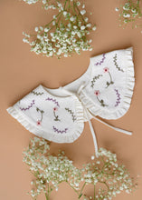 Load image into Gallery viewer, A beautiful detachable victorian style collar with subtle hand embroidery for kids kept on light peach background with some flowers aside.