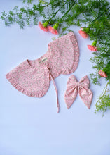 Load image into Gallery viewer, A beautiful pink floral combo of detachable victorian style collar and matching bow with small frills around it for kids kept on light blue background with some flowers aside.