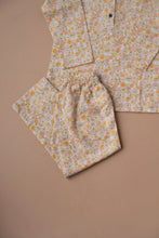 Load image into Gallery viewer, Beautiful cotton pajamas set kept upon a peach background.