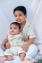 Load image into Gallery viewer, A boy holding a small kid where both are wearing a unisex hooded kurta eco-printed using silver oak leaves.