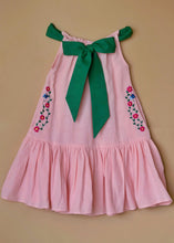 Load image into Gallery viewer, A beautiful dress with extra-long bow tie strap kept on a floor.