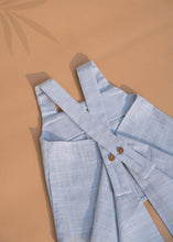 Load image into Gallery viewer, A set of Pure Cotton Pleated Top for baby girl dresses kept on a beige colored background