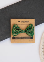 Load image into Gallery viewer, A beautiful Green Silk Hair Clip for hair accessories with branding of PureCloth.Co Placed on a white and black background