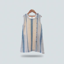Load image into Gallery viewer, A beautiful white A-line shift dress with flattering vertical blue stripes and laced hemline is hanged using hanger.