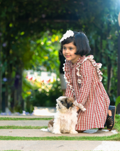 Load image into Gallery viewer, A girl wearing beautiful lace shift dress with matching accessory posing with dog in the middle of the road.