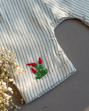 Load image into Gallery viewer, A cute baby girl dress along with matching hair accessory and some flower aside.