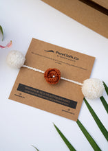 Load image into Gallery viewer, Handmade Crochet Flower Rakhi for Infants and Kids | Chocolate Brown
