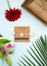 Load image into Gallery viewer, Handmade Crochet Flower Rakhi for Infants and Kids | Off White
