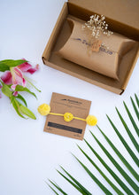 Load image into Gallery viewer, Handmade Crochet Flower Rakhi for Infants and Kids | Yellow
