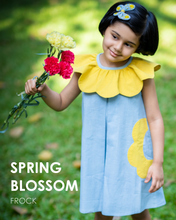 Load image into Gallery viewer, A girl holding flowers and posing it by wearing a beautiful dress with petal detailing&#39;s around the neck and pockets.
